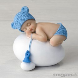 Figura niño bebé azul durmiendo sobre huevo,7,5x8cm.