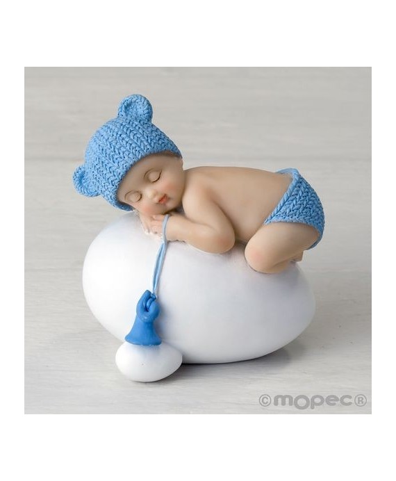 Figura niño bebé azul durmiendo sobre huevo,7,5x8cm.